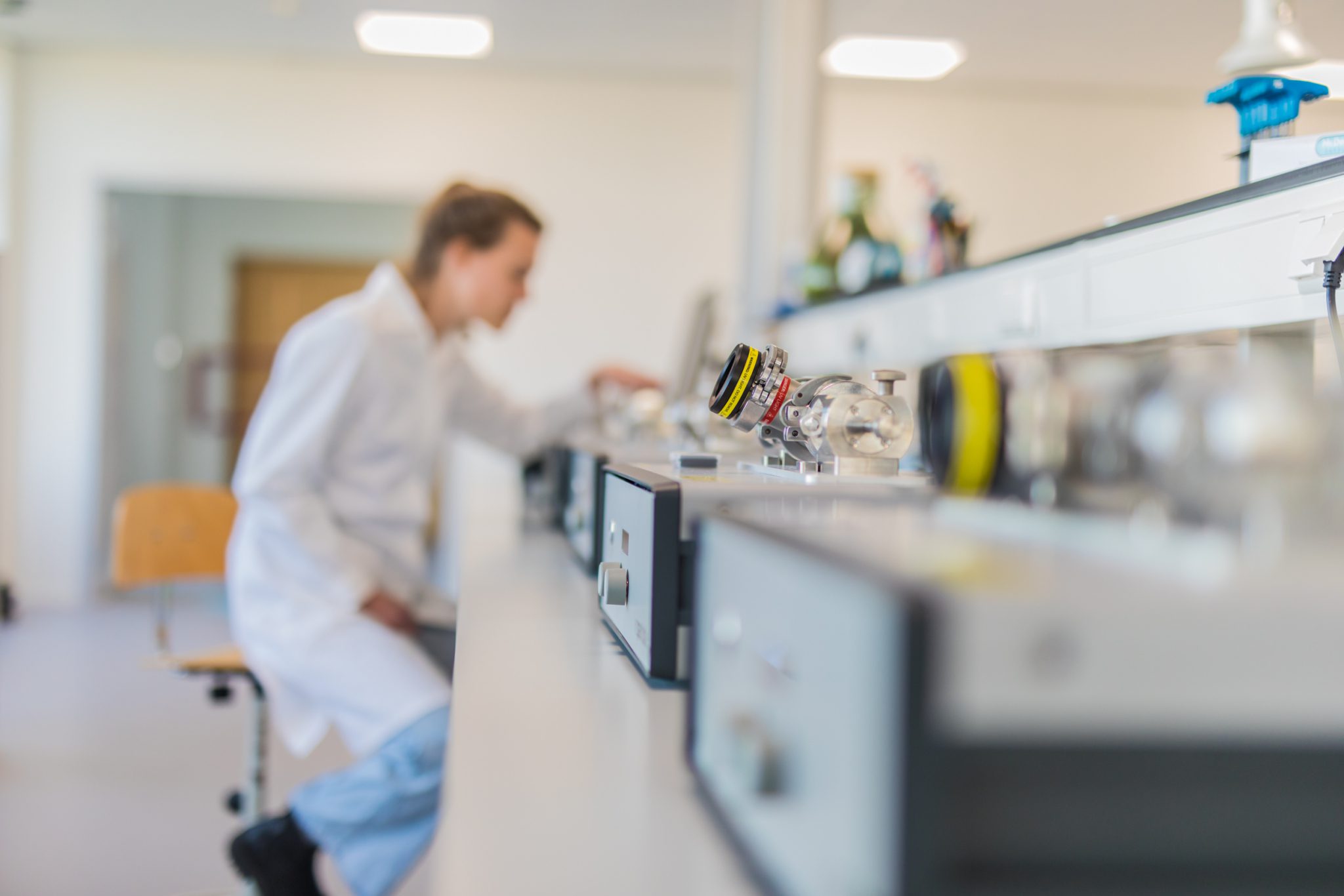 An employee in the lab of VSPARTICLE.