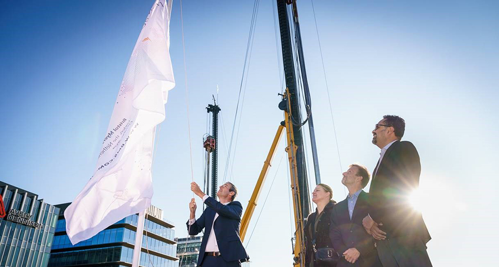Bristol Myers Squibb party raising their flag in Leiden.