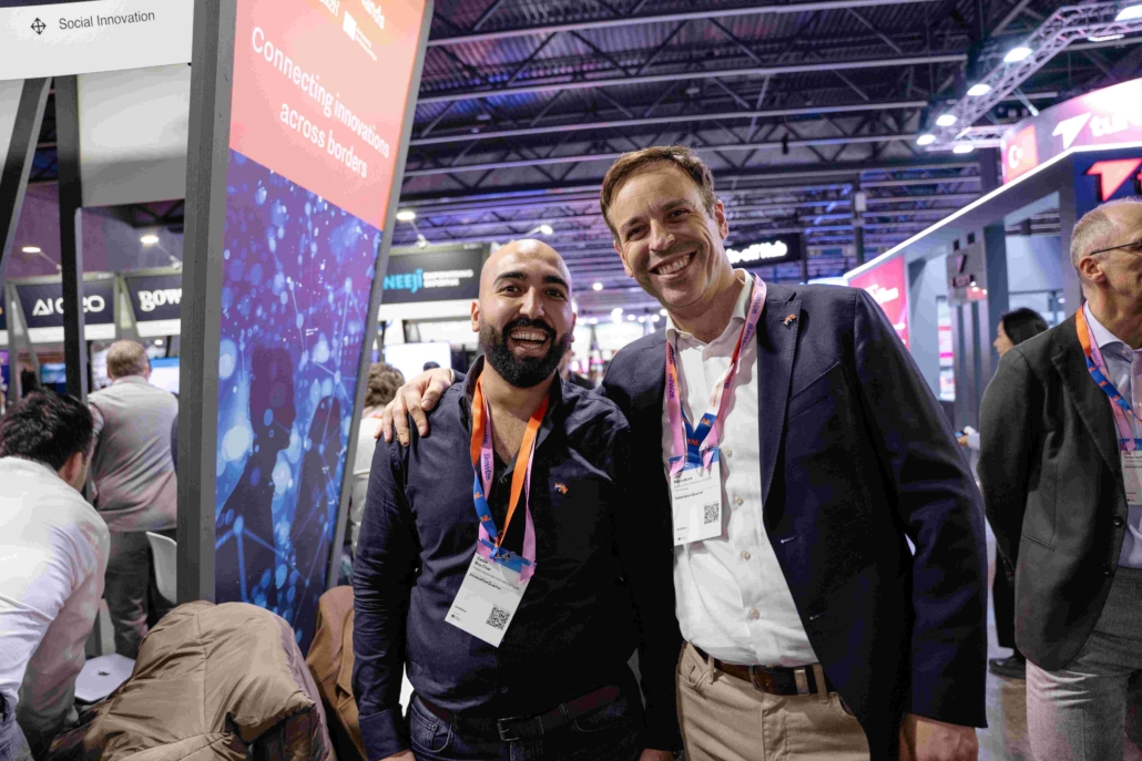 A picture of two smiling men at the event.