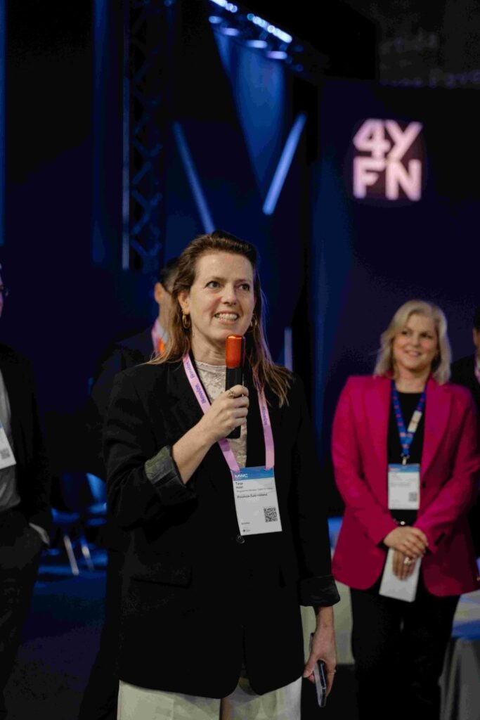 A woman holding a microphone.