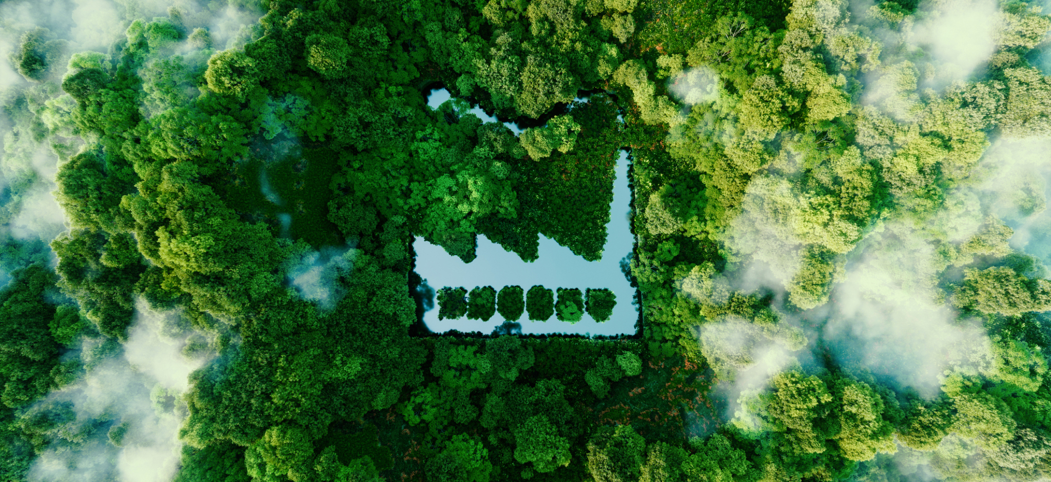 Een vogelvluchtperspectief van een groen park met een meer in het midden.