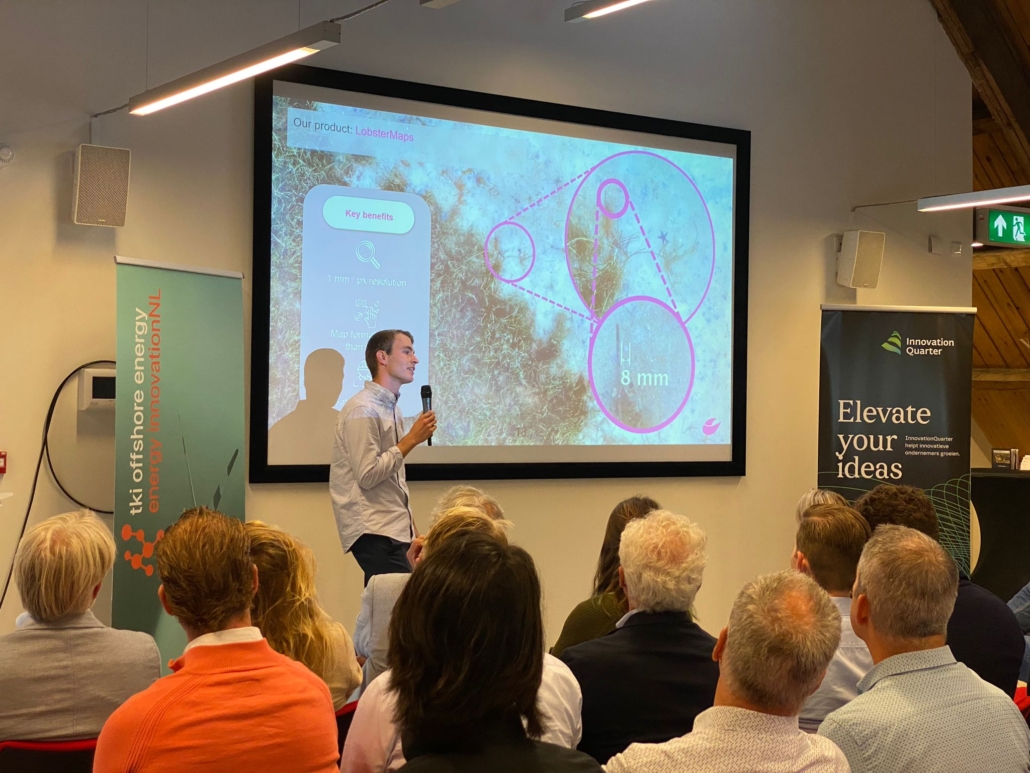 Een presentatie tijdens het 'Elevate your ideas' evenement van InnovationQuarter.